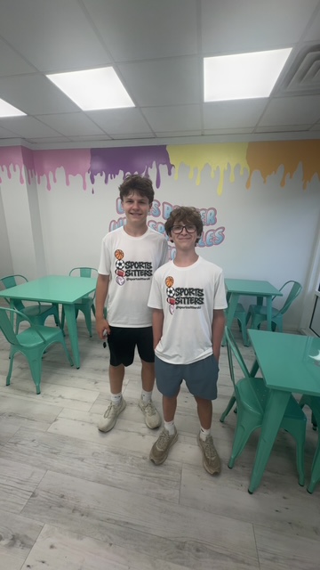 Two Sports Sitters at a community event space