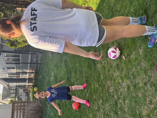 Sports Sitter soccer one-on-one session in backyard