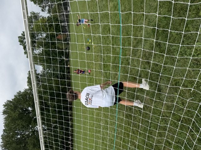 Sports Sitter goalkeeping during a soccer drill